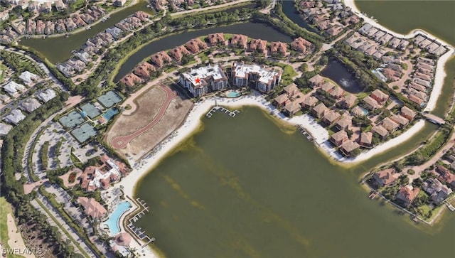 birds eye view of property featuring a water view