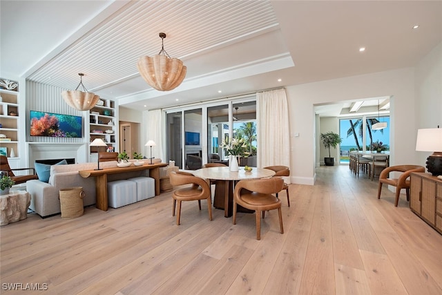 55 13th Ave S, Naples, FL 34102 - dining space with plenty of natural light, light wood-type flooring, a chandelier, baseboards, and recessed lighting