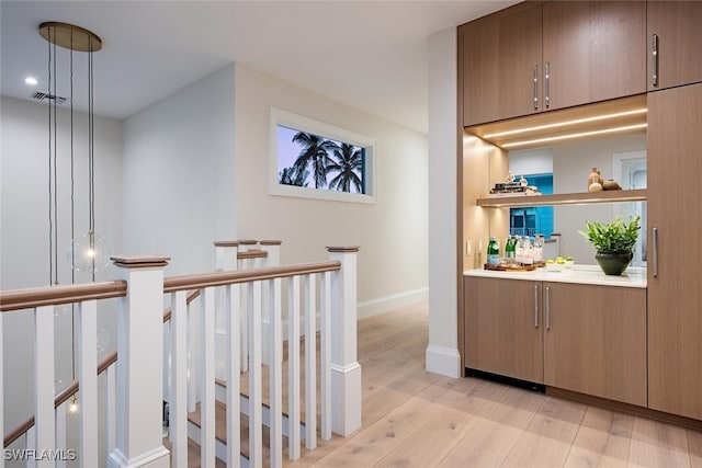 hall featuring light hardwood / wood-style floors