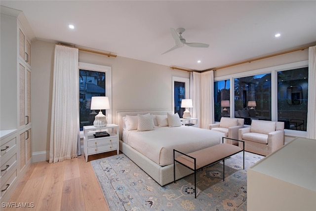 bedroom featuring ceiling fan and light hardwood / wood-style floors