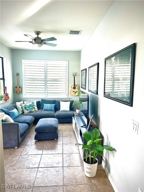 living room featuring ceiling fan