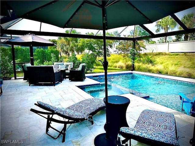 view of pool featuring an in ground hot tub, an outdoor hangout area, and a patio area