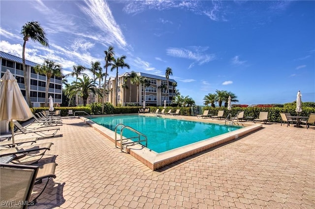 view of swimming pool featuring a patio