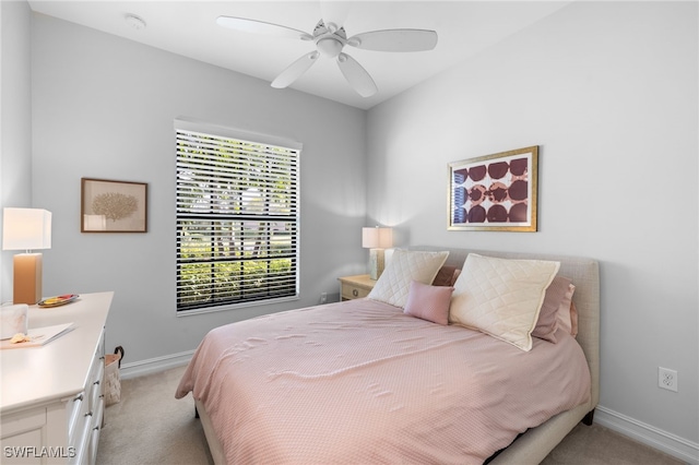 carpeted bedroom featuring ceiling fan