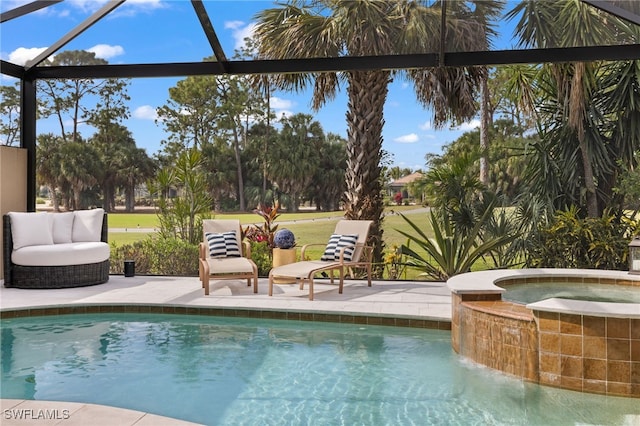 view of swimming pool featuring an in ground hot tub and a patio area