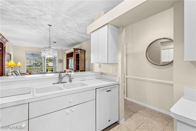 kitchen with white dishwasher, sink, ceiling fan, decorative light fixtures, and white cabinetry