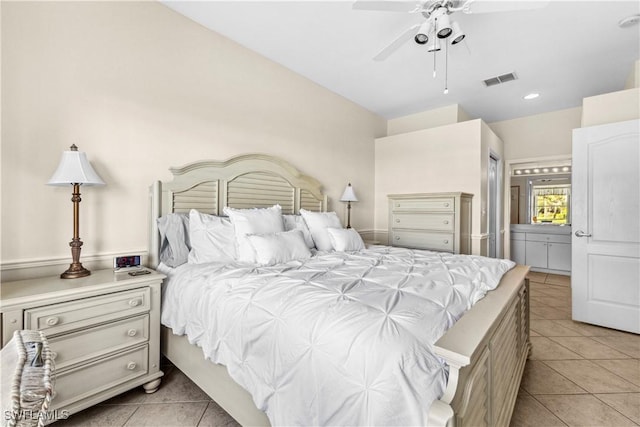 tiled bedroom with ceiling fan