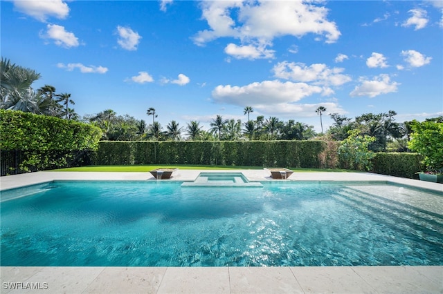 view of swimming pool featuring fence private yard and a pool with connected hot tub