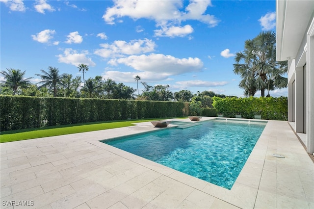 view of pool with a fenced in pool, fence private yard, and a patio