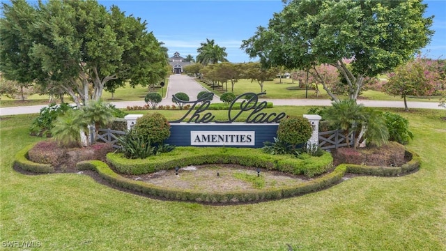 17250 Ashcomb Way, Estero, FL 33928 - community / neighborhood sign featuring a yard