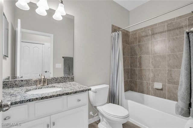 full bathroom featuring toilet, vanity, and shower / bathtub combination with curtain