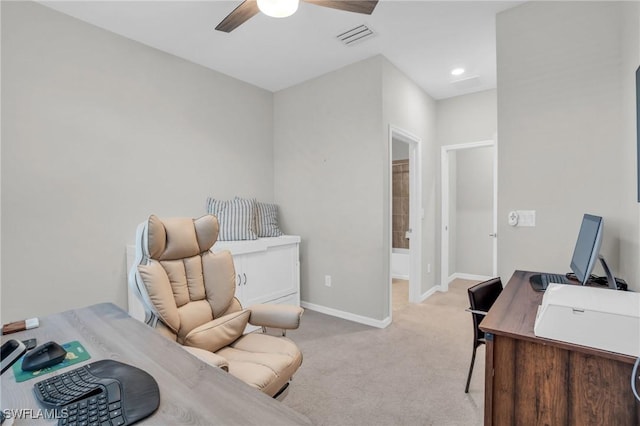 home office with ceiling fan and light colored carpet