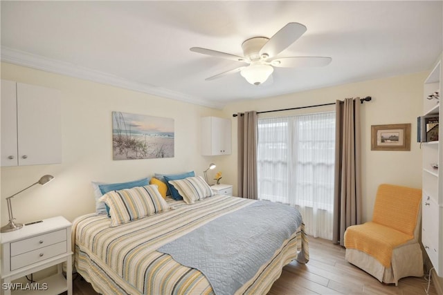 bedroom featuring light hardwood / wood-style flooring and ceiling fan