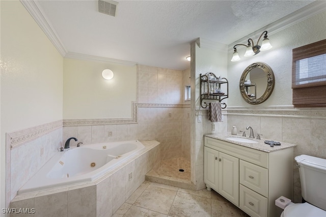 full bathroom with toilet, tile patterned floors, a textured ceiling, crown molding, and vanity