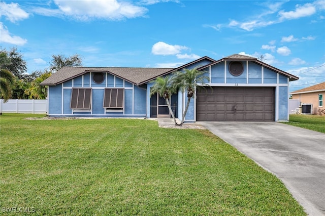 view of front facade featuring a garage and a front yard