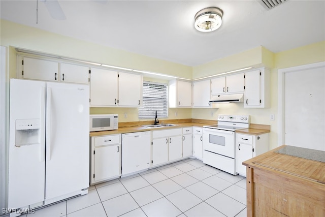 kitchen with white cabinetry, sink, ceiling fan, white appliances, and light tile patterned flooring