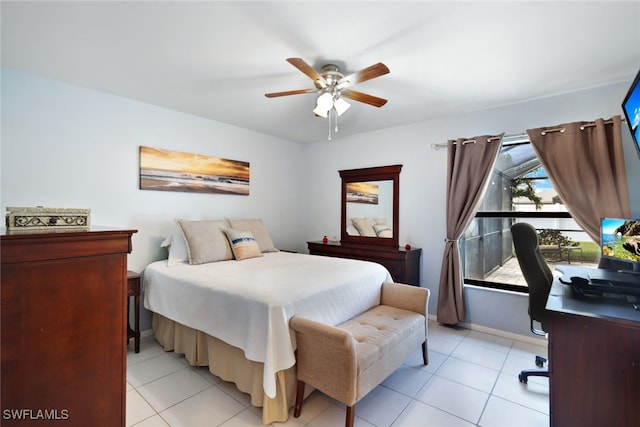 bedroom with ceiling fan and light tile patterned floors