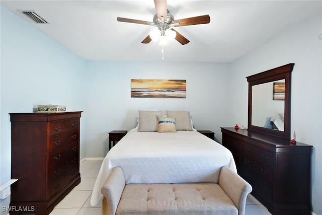 bedroom with ceiling fan and light tile patterned flooring