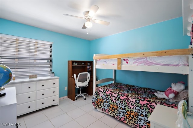 tiled bedroom with ceiling fan