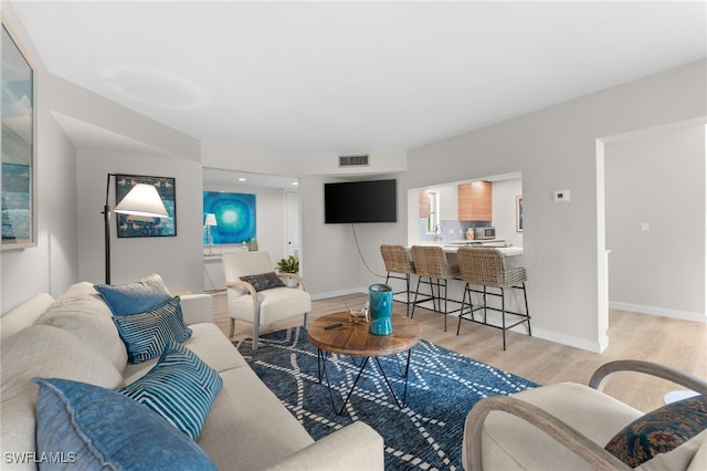 living room featuring light hardwood / wood-style flooring