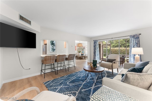 living room with hardwood / wood-style flooring