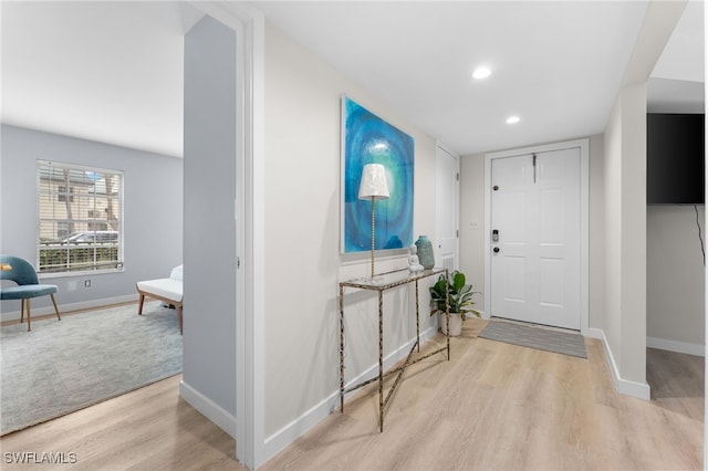 foyer with light wood-type flooring