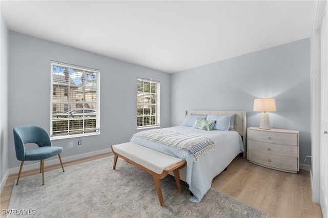 bedroom featuring light hardwood / wood-style floors