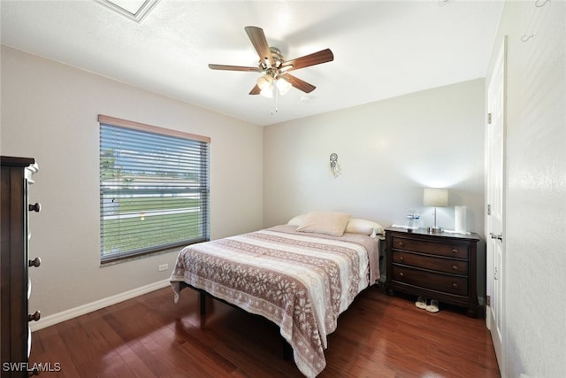 bedroom with wood-type flooring and ceiling fan