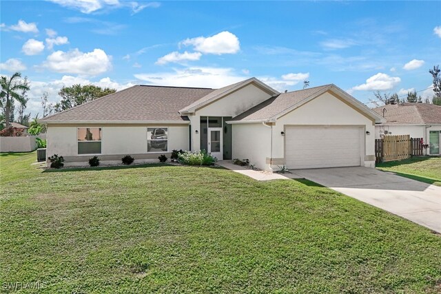 ranch-style house with a front yard and a garage