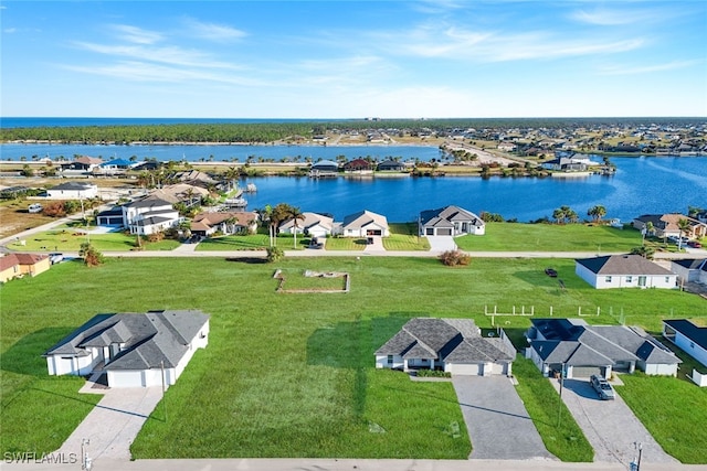 drone / aerial view with a water view