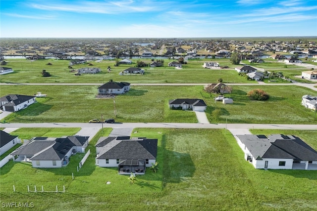 drone / aerial view with a residential view