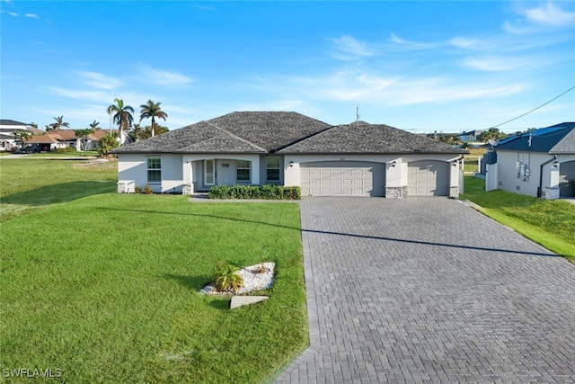 ranch-style house featuring a front lawn, decorative driveway, and stucco siding