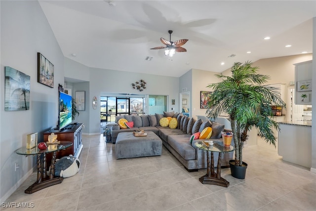 living room featuring light tile patterned floors, recessed lighting, a ceiling fan, high vaulted ceiling, and baseboards