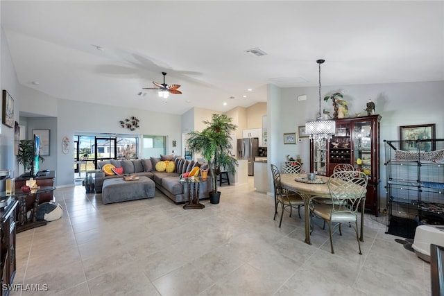 living room with high vaulted ceiling, visible vents, a ceiling fan, and light tile patterned flooring