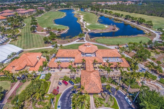 aerial view with a water view and golf course view