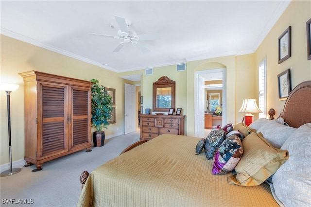 bedroom featuring carpet, visible vents, and crown molding