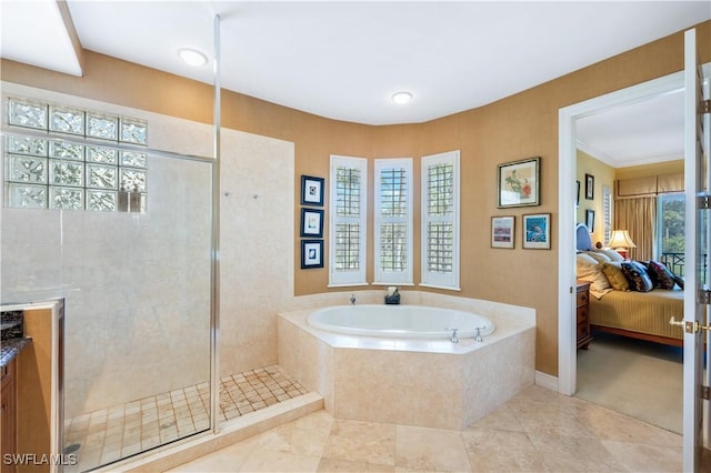 bathroom featuring connected bathroom, tile patterned flooring, vanity, a shower stall, and a bath