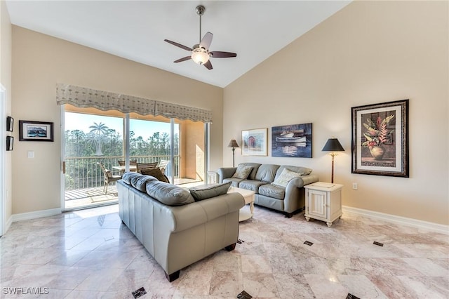 living room featuring ceiling fan and high vaulted ceiling