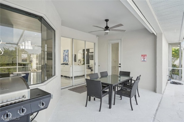 exterior space featuring ceiling fan and grilling area