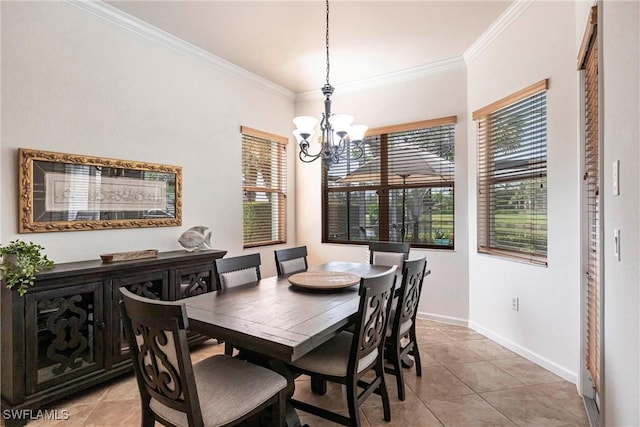 tiled dining room featuring an inviting chandelier, plenty of natural light, and ornamental molding