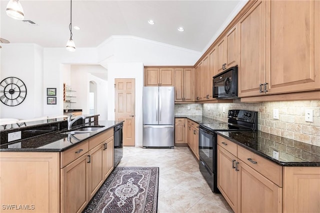 kitchen with sink, hanging light fixtures, backsplash, dark stone counters, and black appliances