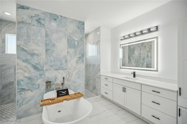 bathroom with shower with separate bathtub, vanity, and tile walls