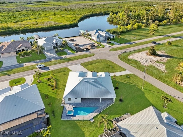 bird's eye view with a water view