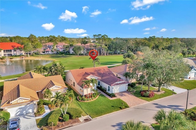 birds eye view of property featuring a water view