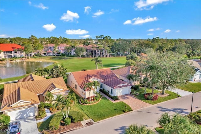 drone / aerial view with a water view