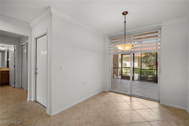 unfurnished dining area featuring crown molding and light tile patterned floors