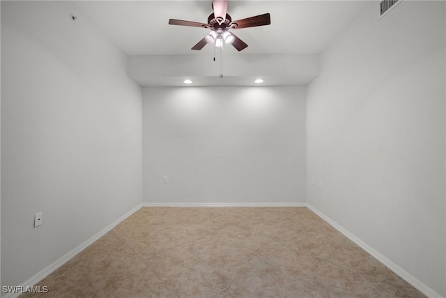 spare room with ceiling fan