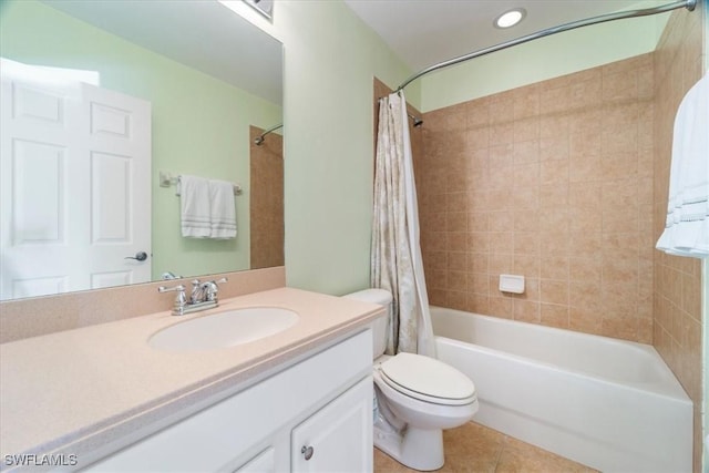 full bathroom featuring toilet, shower / tub combo, vanity, and tile patterned floors