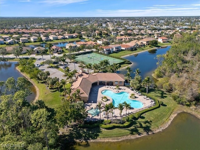 aerial view featuring a residential view and a water view