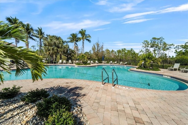 view of pool featuring a patio